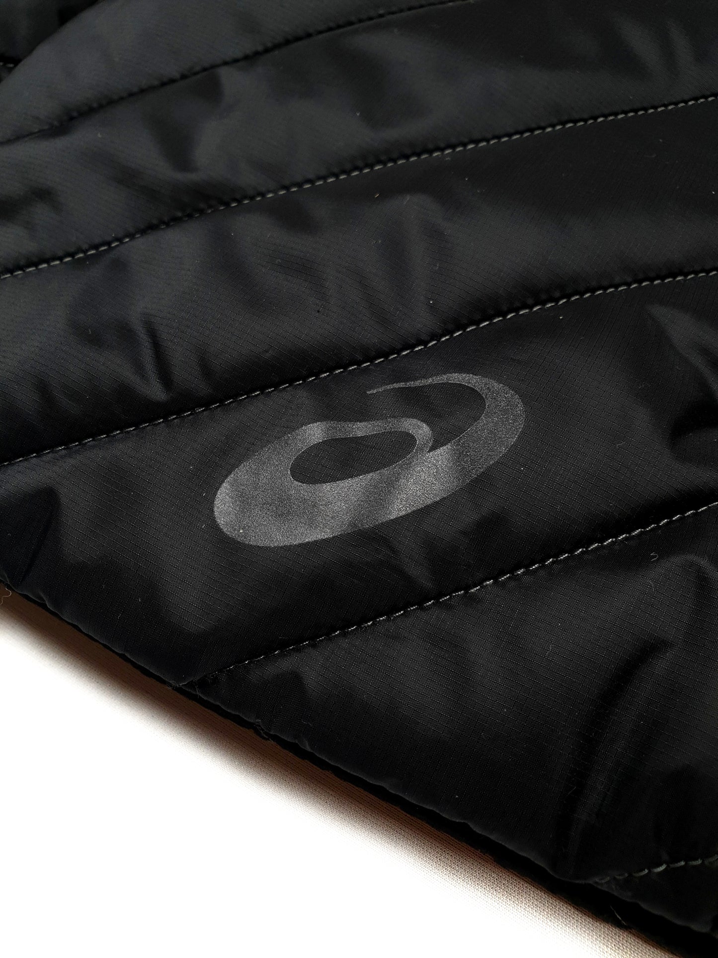 Kiko Kostadinov x Asics lightweight thermal running jacket