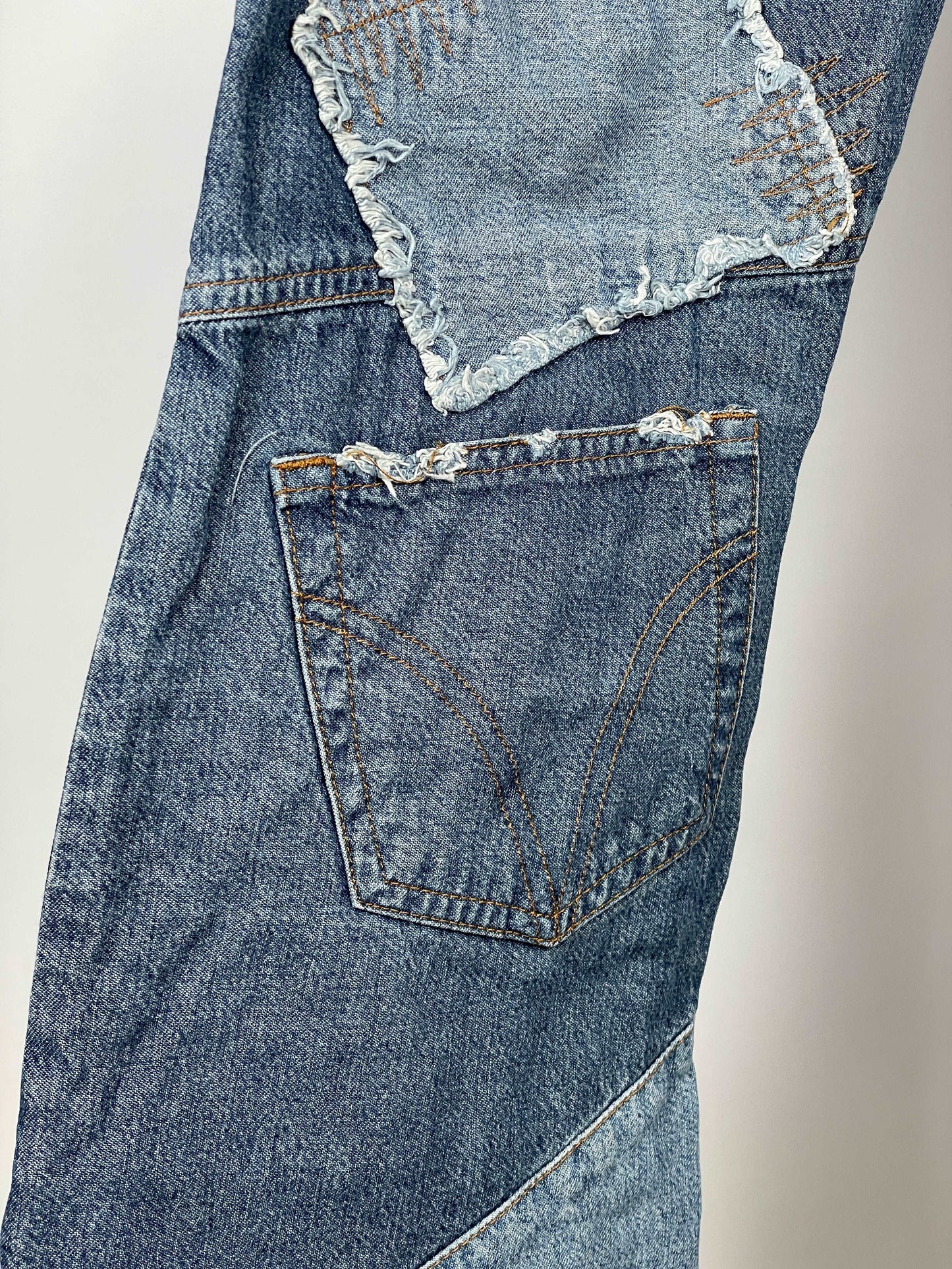 Dolce & Gabbana Flared Reconstructed Denim Jeans