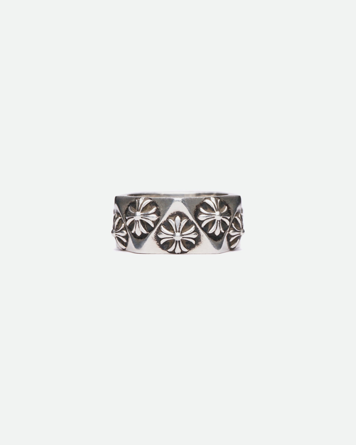 There is a Chrome Hearts Pentagon Plus Ring on white background pictured from the front.
