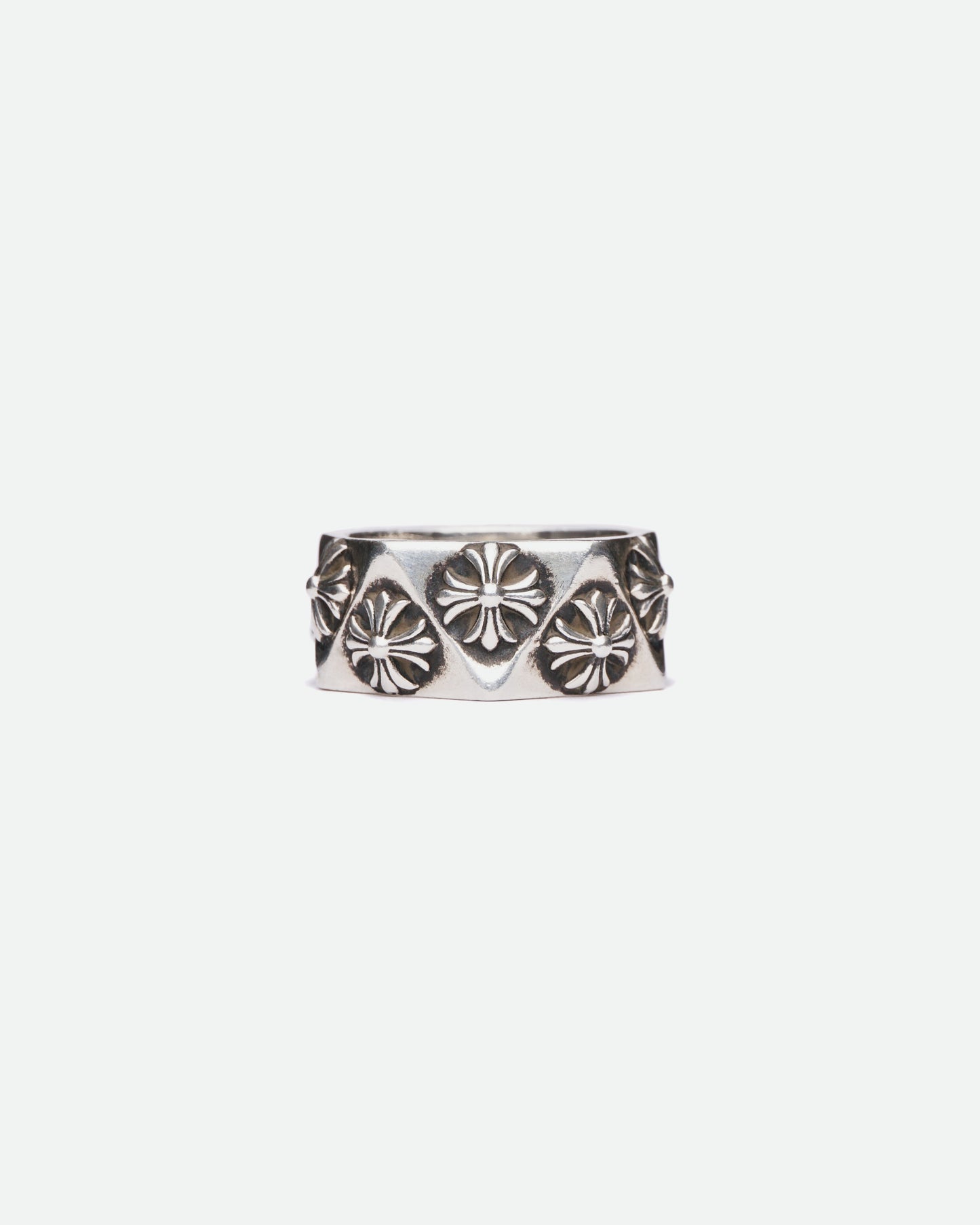 There is a Chrome Hearts Pentagon Plus Ring on white background pictured froom the front.