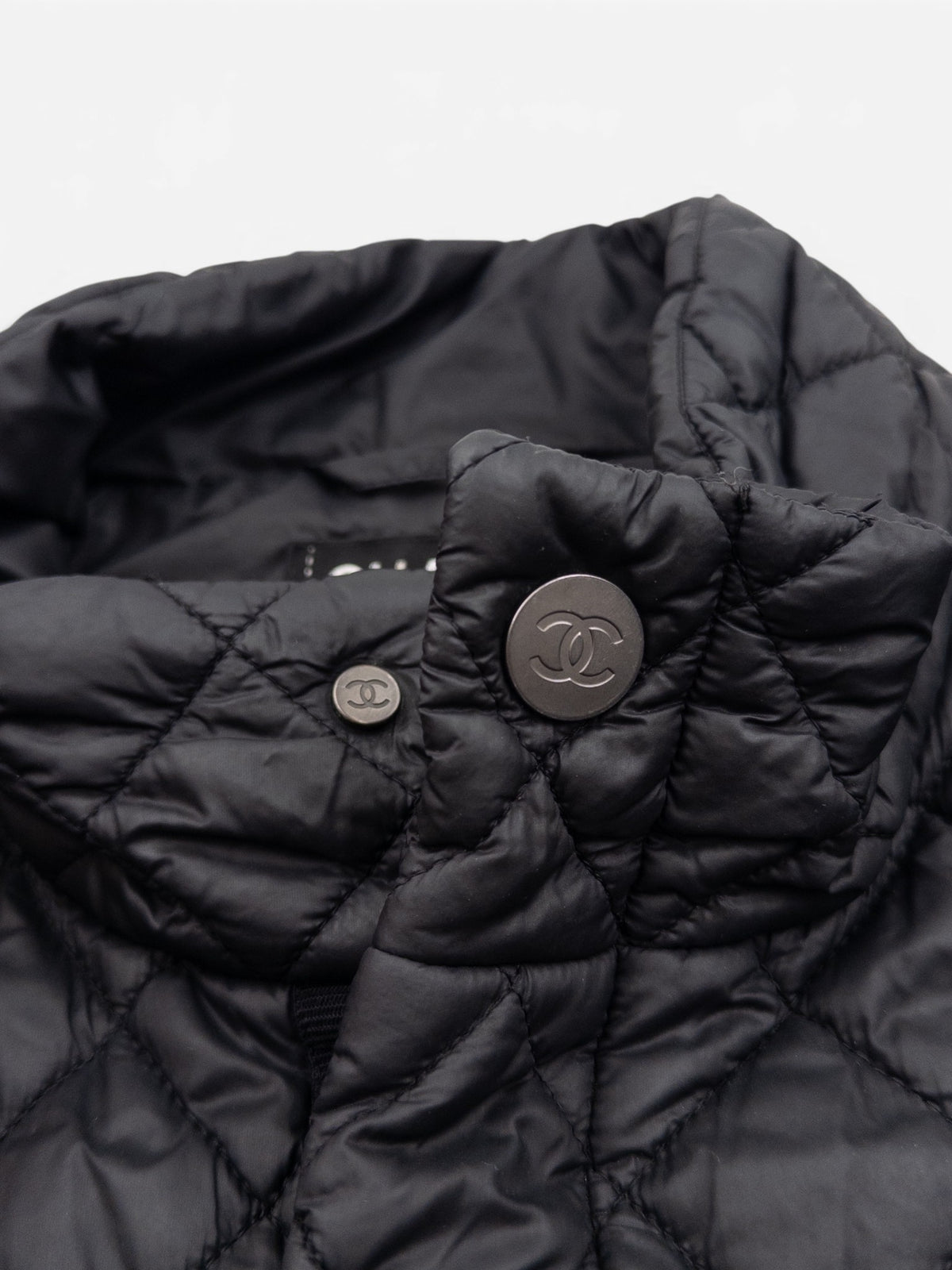 Chanel by Karl Lagerfeld 2010s CC Quilted Puffer Biker Vest – CC button detail