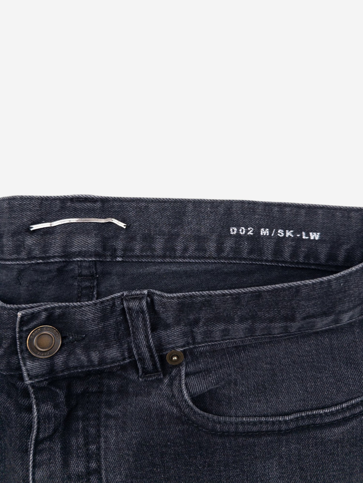 Saint Laurent by Anthony Vaccarello AW16 D02 Scab Patch Denim Jeans – waistband print detail
