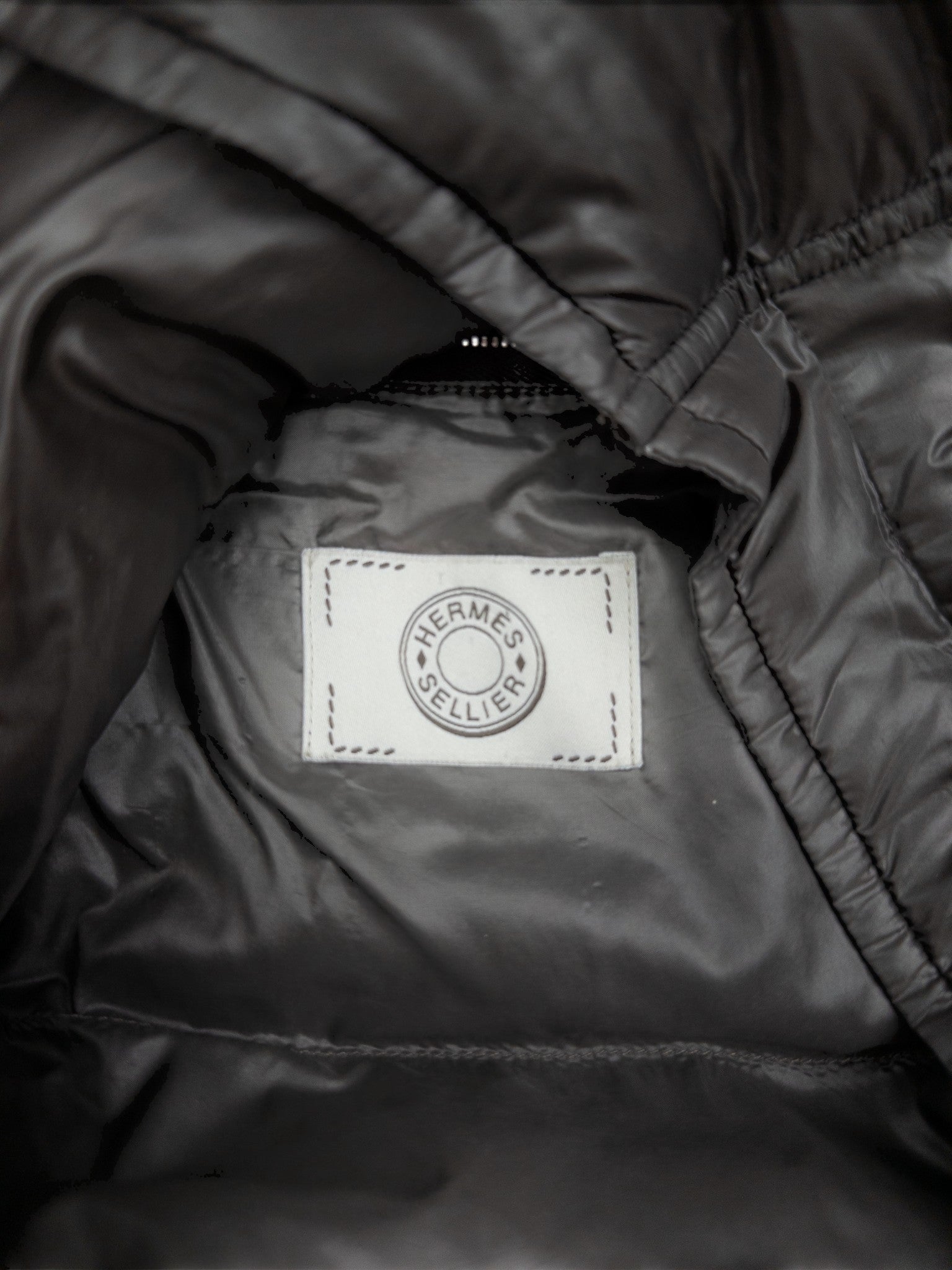 Hermes Sellier Puffer Jacket – brand label