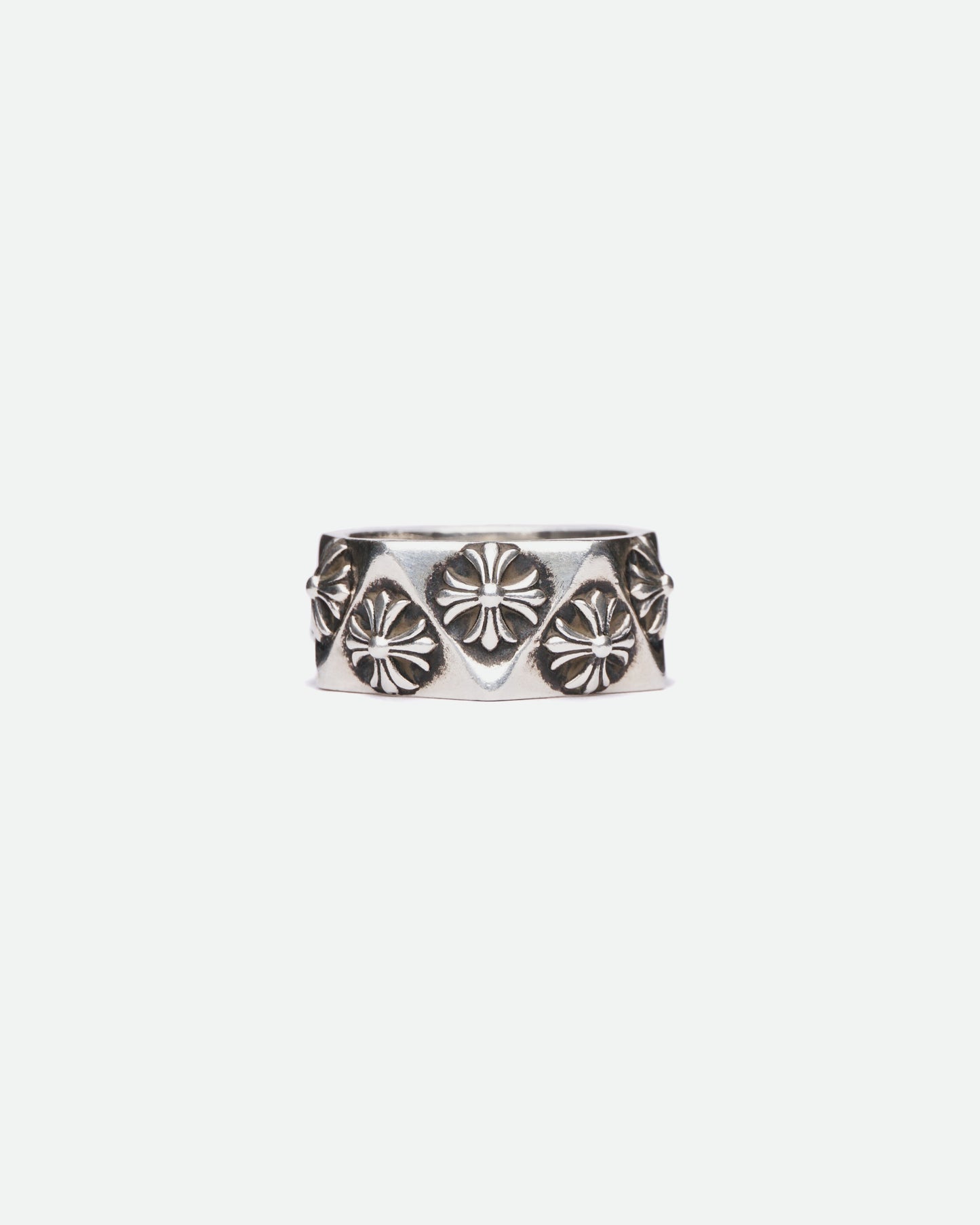There is a Chrome Hearts Pentagon Plus Ring on white background pictured froom the front. 